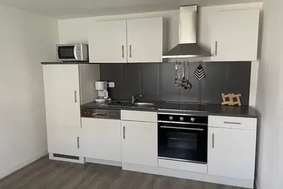 Image de Appartement non fumeur avec accès au jardin pour 2 adultes avec enfant