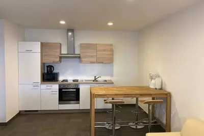 Image de Appartement moderne et de grande qualité avec lit extra large et connexion Wi-Fi gratuite