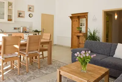 Image de Appartement de 3 chambres avec petit-déjeuner et lit king size