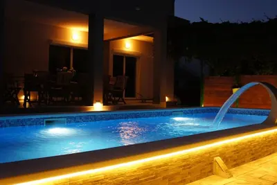 Image de Maison de vacances avec piscine privée et 5 chambres
