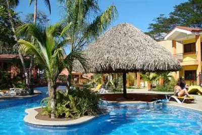 Image de 2 Bdrm Condo, bel aménagement paysager, près de la plage, calme et tropical