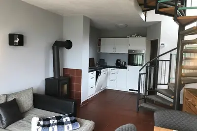 Image de Bungalow de vacances entièrement équipé avec cuisinière et jardin