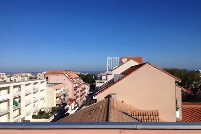 Image de Apt centre ville 50m2, terrasse 20m2 vue bassin, 5 couchages, dernier étage