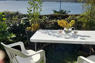 Image de Chalet en bois vue mer, beau jardin, baignade à 5 mn à pied. Chiens acceptés.