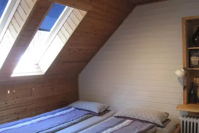 Image de Appartement lumineux à l'étage avec un coin salon confortable