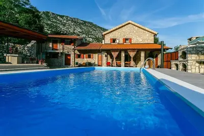 Image de Maison de vacances Drivenik pour 2 - 8 personnes avec 4 chambres Ă coucher - Maison de vacances