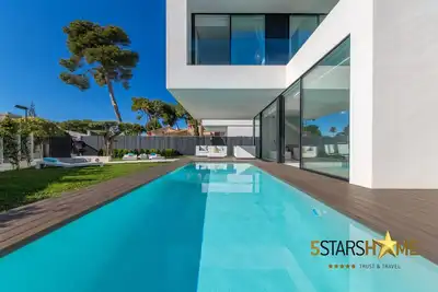 Image de Villa moderne pour 6 avec piscine, Ă seulement 180m de la plage de Muro, Port Alcudia