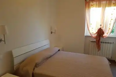 Image de Élégant appartement pour 6 personnes près de la mer et du centre. Géraniums
