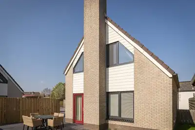 Image de Bungalow spacieux dans un village agréable
