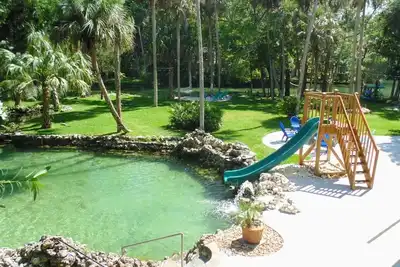 Image de Waterfront Homosassa Home w \/ Lagoon, Large Deck, Dock, Fire Pits & Waterslide!