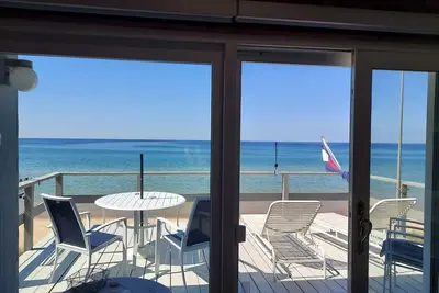 Image de Cottage Ă droite sur la plage du lac Michigan - douce colline au bord de l'eau