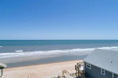 Image de Bienvenue sur The Great Escape, Sand, Surf et Fun vous attendent sur l'océan!