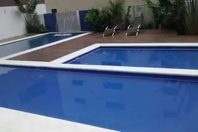 Image de Appartement de deux chambres à coucher à Guarujá