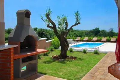 Image de Villa élégante ***** avec piscine et grill, vélos, WiFi gratuit