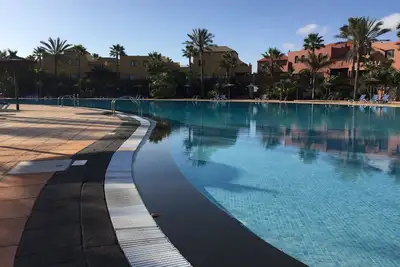 Image de Appartement dans un beau complexe avec grande piscine et terrasse privée