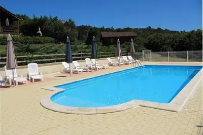 Image de Locations de vacances en Périgord( 3 chalets ) avec piscine chauffée au sel