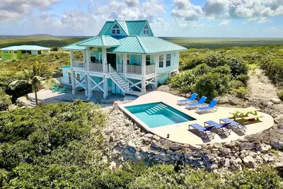 Image de À Voir! ! Maison privée au Dragon Cay Resort sur Middle Caicos avec une vue imprenable! !