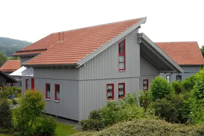 Ferienholzhausatmosphäre, cuisine, 4 personnes, internet et piscine d'aventure