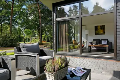 Image de Chalet avec Smart Tv, juste à côté de la forêt