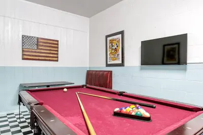 Image de Belle et élégante maison avec 6 chambres, piscine et salle de jeux, dans le quartier populaire de ChampionsGate