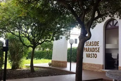 Image de Maison de plage avec grand jardin