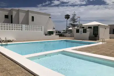 Appartement d'une chambre avec wifi dans un complexe tranquille avec piscine commune