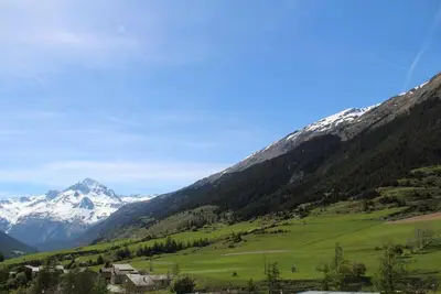 Image de À 10m des pistes de ski, vue montagne, terrasse, parking, télévision, casier à ski, 63m², Val Cenis