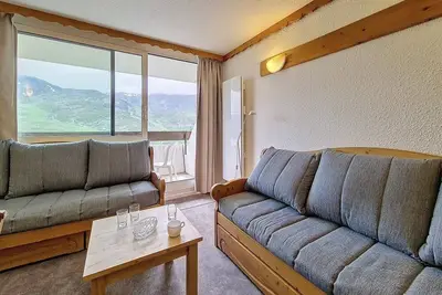 Image de Pied des pistes de ski, 12ème étage, vue pistes de ski, balcon, télévision, casier à ski, 39m²