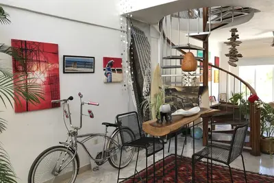 Image de Magnifique condo confortable avec piscine - 5min. à pied de la plage, très bien situé