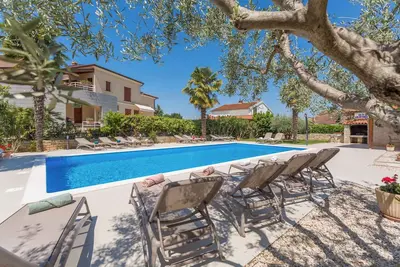 Image de Appartement de vacances avec l'utilisation de la piscine et la climatisation