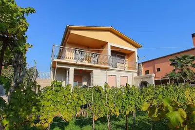 Image de Appartement de vacances avec balcon, grill et WiFi