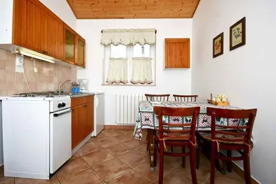 Image de Appartement de vacances avec climatisation, Tv et jardin
