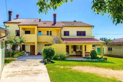 Image de Maison de vacances avec climatisation et terrasse