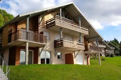Image de Appartement dans chalet proche centre ville et pistes. Terrasse vue Lac, Wifi