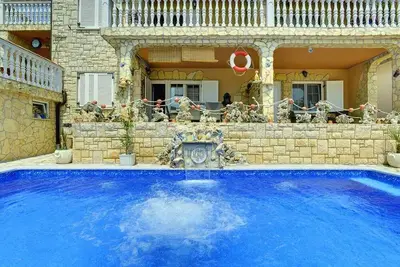 Image de Appartement de vacances avec climatisation, piscine commune