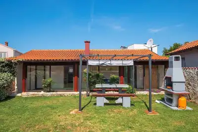 Maison de vacances avec jardin et air conditionné