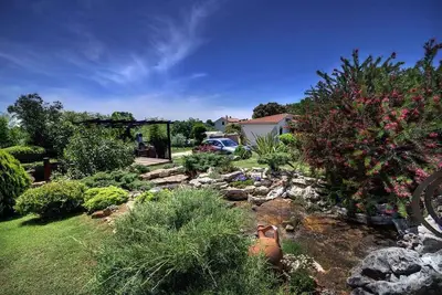 Image de Appartement de vacances avec piscine partagée et WiFi