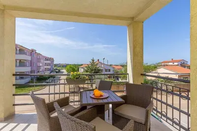 Image de Appartement de vacances avec climatisation et balcon