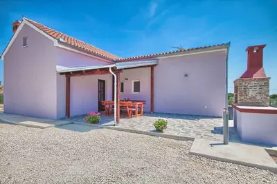 Image de Maison de vacances avec jardin et air conditionné