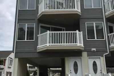 Image de Belle Diamond Beach Townhome avec piscine et vue sur l'océan!