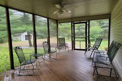 Image de Maison dans les pins. 6 minutes de Sand Valley Golf Resort et Petenwell