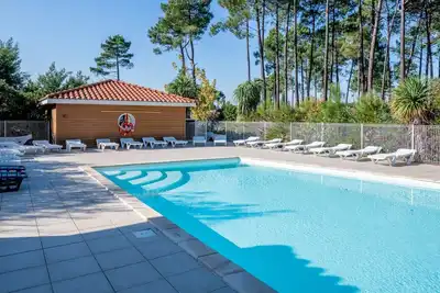 Image de Appartement cosy avec accès piscine | A quelques pas du lac!