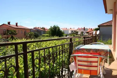 Image de Appartement de vacances avec air conditionné et barbecue