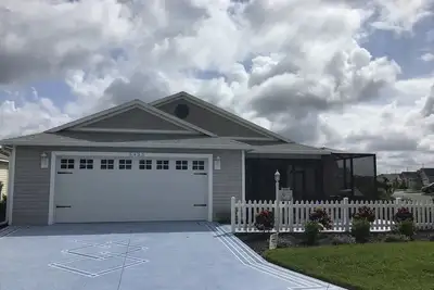 Image de Belle nouvelle villa 2/2 qui accepte les animaux de compagnie avec voiturette de golf, barbecue et WiFi gratuit!