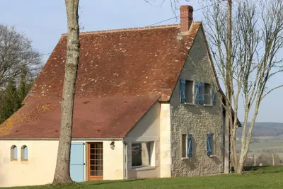 Image de Maison percheronne avec jardin, animaux acceptés, WiFi, cheminée, proche commerces