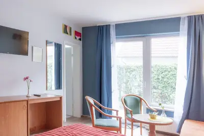 Image de Chambre de vacances avec terrasse \/ vue sur le lac