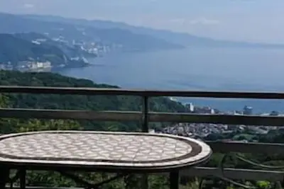 Image de A spectacular view! Relax on the sea-view terrace / Scandinavian log house with hot spring & fireplace