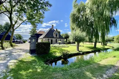 Image de Bergen: belle maison de vacances, emplacement idyllique; grand jardin avec aire de jeux et belle vue, près de la plage