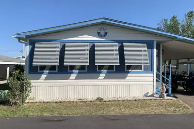 Image de Oceanside Village: voiturette de golf, WiFi, linge de maison, communauté fermée, parking en bord de mer