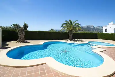 Image de Appartement dans une maison de vacances avec climatisation, Wifi, piscine, Tv, terrasse, parking